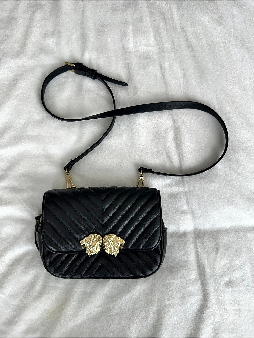 Zara Quilted Gold Lion Crossbody Bag in Black